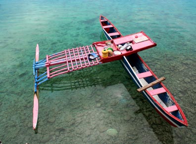 A Mwoakillese outrigger canoe